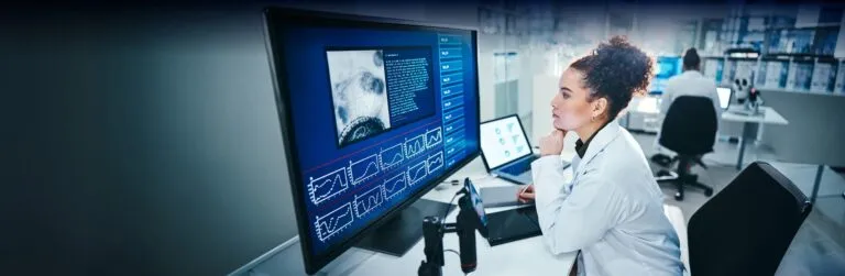 medical staff using visual stylus and monitor